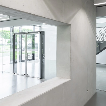 Interior view of the Sangl headquarters in Erlangen, with glass façade